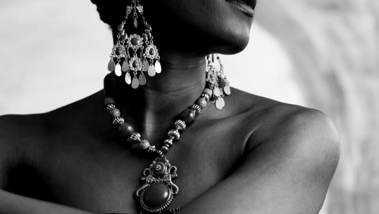 Layering jewelry on black and white garments